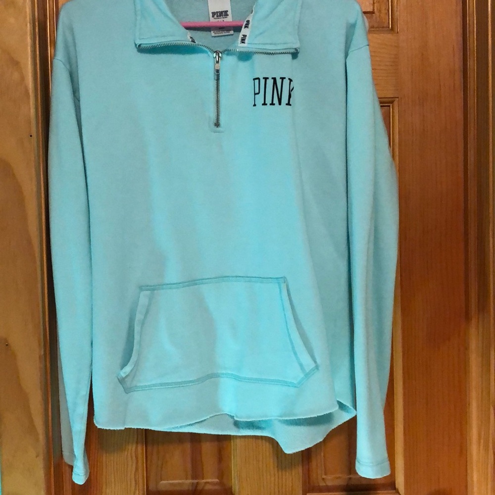 Lose fitting baby blue pink sweatshirt